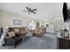 Comfortable living room with plush sofas, coffee table and television at 4771 Wild Iris Dr. # 204, Myrtle Beach, SC 29577