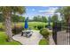 Scenic picnic area with multiple tables, charcoal grills, and lush green landscaping at 4771 Wild Iris Dr. # 204, Myrtle Beach, SC 29577