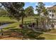 Recreational area featuring picnic tables, a waterway and golf course views, and lush landscaping at 4771 Wild Iris Dr. # 204, Myrtle Beach, SC 29577