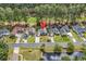 Aerial view of a neighborhood featuring well-maintained homes and lush greenery at 4738 Southern Trail, Myrtle Beach, SC 29579