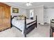 Spacious bedroom featuring carpet, a large closet, and access to an ensuite bathroom at 4738 Southern Trail, Myrtle Beach, SC 29579
