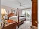 Inviting bedroom with four poster bed, soft natural light, and calming neutral tones at 4738 Southern Trail, Myrtle Beach, SC 29579