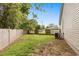 Fenced backyard with a section with a trellis and an exterior AC unit at 503 Alston St., Conway, SC 29527