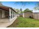 View of backyard featuring a sunroom and shed, offering space and functionality at 503 Alston St., Conway, SC 29527