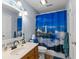 Charming bathroom with a lighthouse themed shower curtain at 503 Alston St., Conway, SC 29527