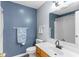 Bathroom features modern vanity, fixtures, and blue accent wall at 503 Alston St., Conway, SC 29527