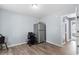 Bonus room with vinyl floors, refrigerator, and adjacent access to outside at 503 Alston St., Conway, SC 29527