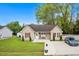 Charming single-story home with a well-manicured lawn and cozy front porch at 503 Alston St., Conway, SC 29527
