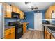 Kitchen with black appliances and wood cabinets at 503 Alston St., Conway, SC 29527