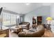 Comfortable living room with vaulted ceiling and modern decor, perfect for relaxing at 503 Alston St., Conway, SC 29527