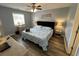 Comfortable bedroom with a large window, light walls, and modern decor at 569 Blue River Ct. # 9-A, Myrtle Beach, SC 29579