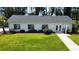 Community clubhouse with manicured lawn and landscaping at 569 Blue River Ct. # 9-A, Myrtle Beach, SC 29579