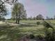 Enjoy serene views of the lush green golf course, trees, and nature at 569 Blue River Ct. # 9-A, Myrtle Beach, SC 29579