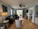 Comfortable living room with a view of the exterior and a comfortable sectional at 569 Blue River Ct. # 9-A, Myrtle Beach, SC 29579