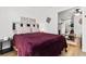 Cozy bedroom with a comfortable queen-sized bed and easy access to laundry area at 610 Putters Ln. # H-109, Little River, SC 29566
