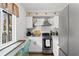 Bright kitchen featuring stainless steel appliances and a cozy window seat with a view at 610 Putters Ln. # H-109, Little River, SC 29566