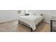 Cozy bedroom with a large window and a soft, inviting bed at 7037 Grant St., Little River, SC 29566