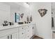 Elegant bathroom with double sinks, modern fixtures, and sleek countertops at 804 Edisto Ct., Myrtle Beach, SC 29588