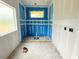 A bathroom under construction with a blue waterproof coating ready for tiling, and a window at 804 Edisto Ct., Myrtle Beach, SC 29588