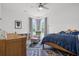 Comfortable bedroom with a cozy chair, bookshelves, and a teddy bear on the bed at 804 Edisto Ct., Myrtle Beach, SC 29588