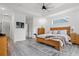 Bright bedroom boasting a tray ceiling, wood furniture, and recessed lighting at 804 Edisto Ct., Myrtle Beach, SC 29588