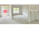 A large entryway with an open door and a large window showcases natural light in the new home construction at 804 Edisto Ct., Myrtle Beach, SC 29588