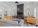 Inviting living room boasts modern fireplace, high ceilings, and comfortable seating at 804 Edisto Ct., Myrtle Beach, SC 29588