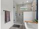 Luxurious shower with glass enclosure, marble tile, and rain shower head at 804 Edisto Ct., Myrtle Beach, SC 29588
