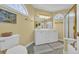 Bathroom with double sink vanity, large mirror, and tiled floors at 901 Bear Lake Dr., Longs, SC 29568