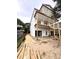 Under-construction, a three-story home with a new roof and siding is ready for the finishing touches at 914 Perrin Dr., North Myrtle Beach, SC 29582