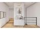 Hallway with wooden flooring, modern art, and a stylish console table with decor at 914 Perrin Dr., North Myrtle Beach, SC 29582