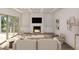 Bright living room with a modern fireplace, built-in shelves, and a sliding door to the patio at 914 Perrin Dr., North Myrtle Beach, SC 29582