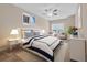 Beautiful bedroom with cozy decor, ceiling fan, and inviting natural light at 1545 Spinnaker Dr. # 2C, North Myrtle Beach, SC 29582