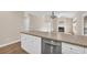 Modern kitchen with granite countertops, stainless steel appliances, and a center island with seating at 1545 Spinnaker Dr. # 2C, North Myrtle Beach, SC 29582