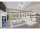 Bright living room with fireplace, large windows, and an open floor plan at 1545 Spinnaker Dr. # 2C, North Myrtle Beach, SC 29582