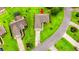 Aerial view of a lovely home with a spacious driveway and neatly landscaped yard in a quiet residential neighborhood at 232 Marbella Dr., Murrells Inlet, SC 29576