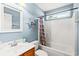 Updated bathroom with a stylish vanity, nautical decor, and a shower-tub combination at 232 Marbella Dr., Murrells Inlet, SC 29576