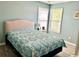 Cozy bedroom with a comfortable bed, natural light, and calming blue walls at 232 Marbella Dr., Murrells Inlet, SC 29576