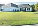 Charming single-story home with attached garage, well-manicured lawn, and tasteful landscaping at 232 Marbella Dr., Murrells Inlet, SC 29576