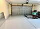 Spacious two car garage featuring an epoxy floor at 232 Marbella Dr., Murrells Inlet, SC 29576