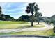 Scenic view of the lush green golf course, perfect for a relaxing day at 232 Marbella Dr., Murrells Inlet, SC 29576