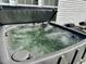 Backyard patio featuring a hot tub and seating at 232 Marbella Dr., Murrells Inlet, SC 29576