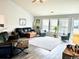 Spacious living room featuring ample seating, large windows, and modern decor at 232 Marbella Dr., Murrells Inlet, SC 29576