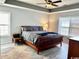 Spacious main bedroom features a tray ceiling, large windows, and ample natural light at 232 Marbella Dr., Murrells Inlet, SC 29576