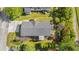 Birds-eye view of house showing roof, lawn, and back deck with partially covered area for shade at 499 Folly Estates Dr., Myrtle Beach, SC 29588