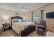 Inviting bedroom with carpet, a window view, and a ceiling fan at 499 Folly Estates Dr., Myrtle Beach, SC 29588