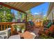 Inviting outdoor deck with plenty of seating and shade for entertaining or relaxing outdoors at 499 Folly Estates Dr., Myrtle Beach, SC 29588