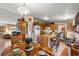Dining area adjacent to the kitchen, featuring a round wooden table and comfortable seating at 499 Folly Estates Dr., Myrtle Beach, SC 29588