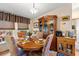Formal dining room with a wooden table, chairs, and a decorative china cabinet at 499 Folly Estates Dr., Myrtle Beach, SC 29588