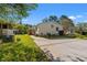 Single-story home with a well-manicured lawn and a concrete driveway at 499 Folly Estates Dr., Myrtle Beach, SC 29588
